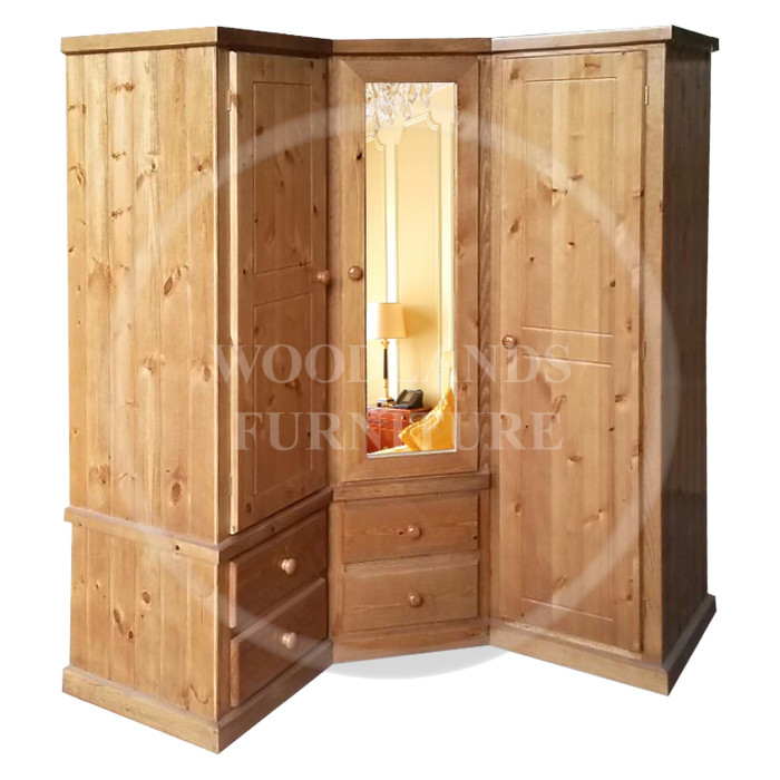 CORNER PINE MIRRORED WARDROBE IN ANTIQUE WAX
