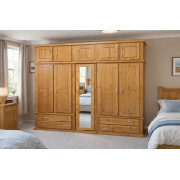 DEWSBURY SOLID PINE 5 DOOR 4 DRAWER FULL MIRRORED WARDROBE WITH TOPBOX IN LIGHT OAK POLISHED DEWSBURY SOLID PINE 5 DOOR 4 DRAWER FULL MIRRORED WARDROBE WITH TOPBOX IN LIGHT OAK POLISHED